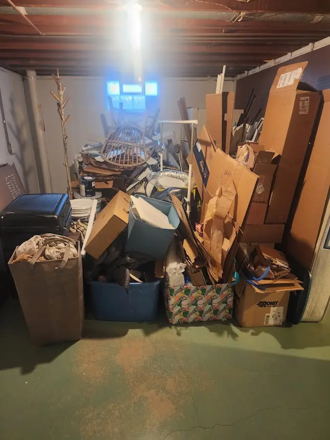 Roll-off dumpster container at job site for Concrete Dumpster Rental in Longbranch